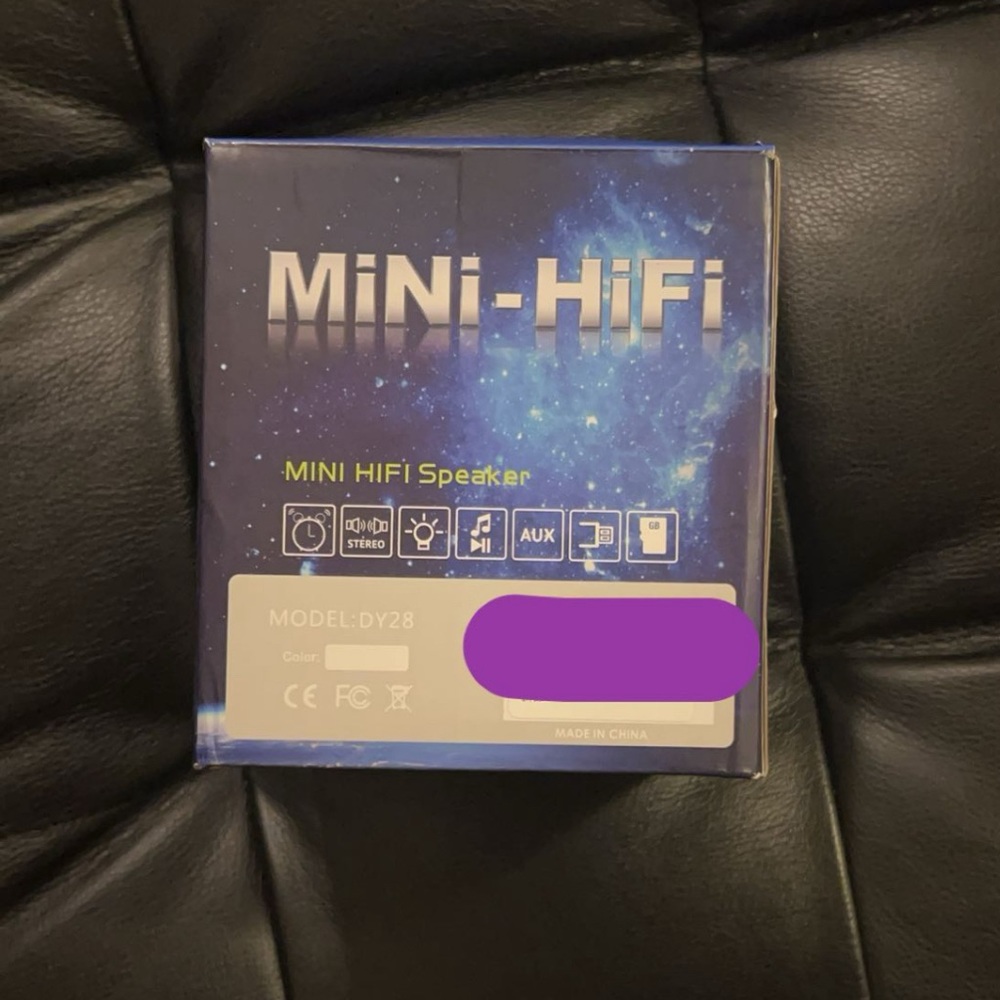 Mini speaker/alarm clock with changing colors!